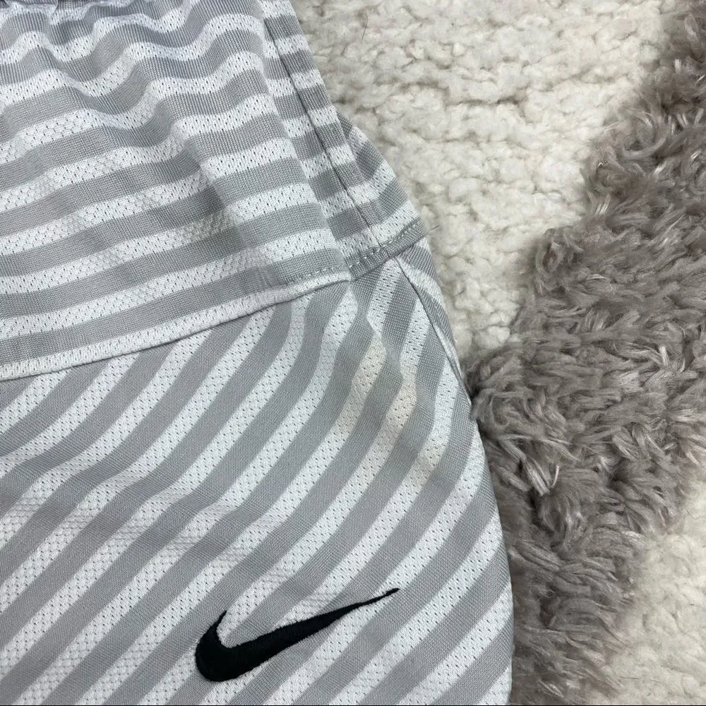 Nike small stain logo